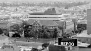 Black and white photo shows 1970s, concrete 'brutalist' style building.